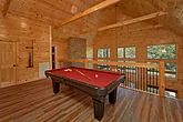 Cabin on the river with a pool table and theater