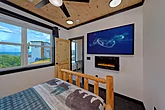 Queen Bedroom with Electric Fireplace & TV