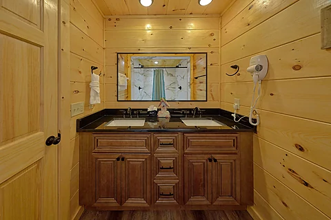 Cabin rental master bathroom with double sinks  - An Eagle's View