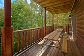 4 bedroom cabin with picnic table and hot tub