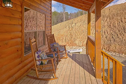 Rocking Chairs on porch of 5 bedroom cabin - Brooks Haven