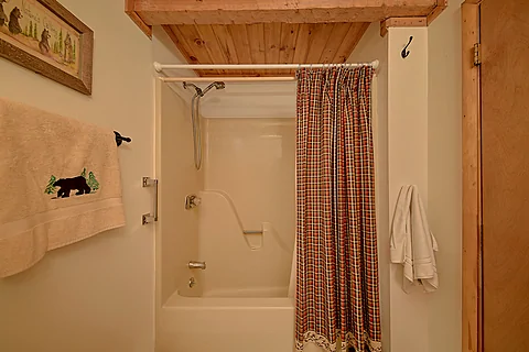 Main Level Full Bathroom with Tub Shower Combo - Bruno's Mountain Cave