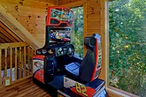 Racing game arcade and pool table in cabin 