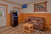 Arcade game room in 1 bedroom cabin rental