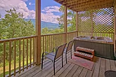 1 bedroom cabin with hot tub and mountain views