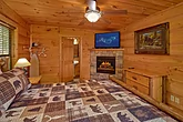 Cabin master bedroom with fireplace and jacuzzi