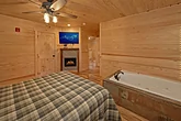 Queen bedroom with Jacuzzi Tub and Fireplace