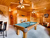 2 bedroom cabin with a pool table downstairs