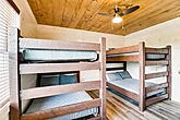 Resort cabin with 25 bedrooms for 70 people