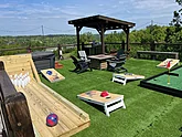 Cabin with rooftop hot tub and outdoor games