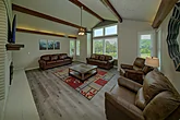 Spacious living room in 8 bedroom rental cabin