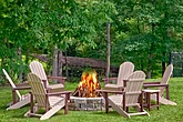 Wood burning fire pit at 8 bedroom cabin rental