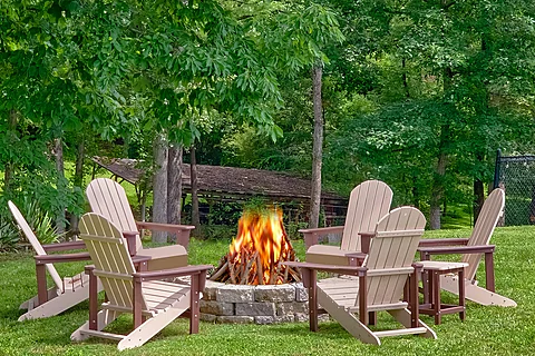 Wood burning fire pit at 8 bedroom cabin rental - The Oasis