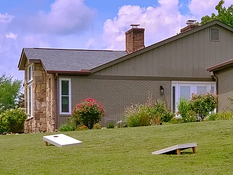8 bedroom cabin with corn hole and zipline swing - The Oasis