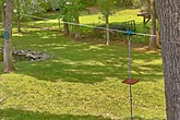 8 bedroom cabin with zipline swing and fish pond
