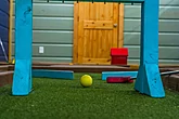 Cabin game room with putt putt game for kids
