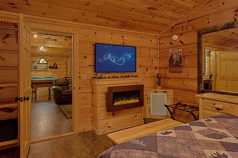 Master Bedroom with Electric Fireplace and TV - Webb Creek Hideaway